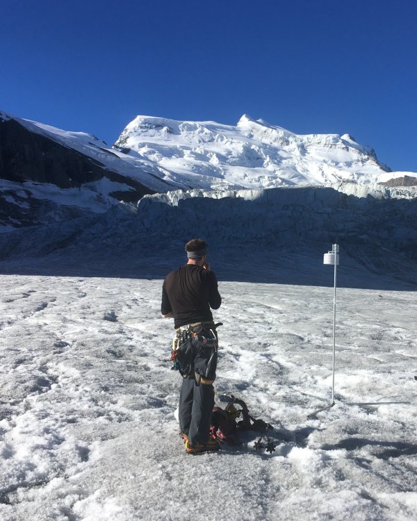CorbassiereGlacier Fieldwork View GrandCombin V1 Thomas Shaw looking upward to the Grand Combin on a very warm summer day in 2022.