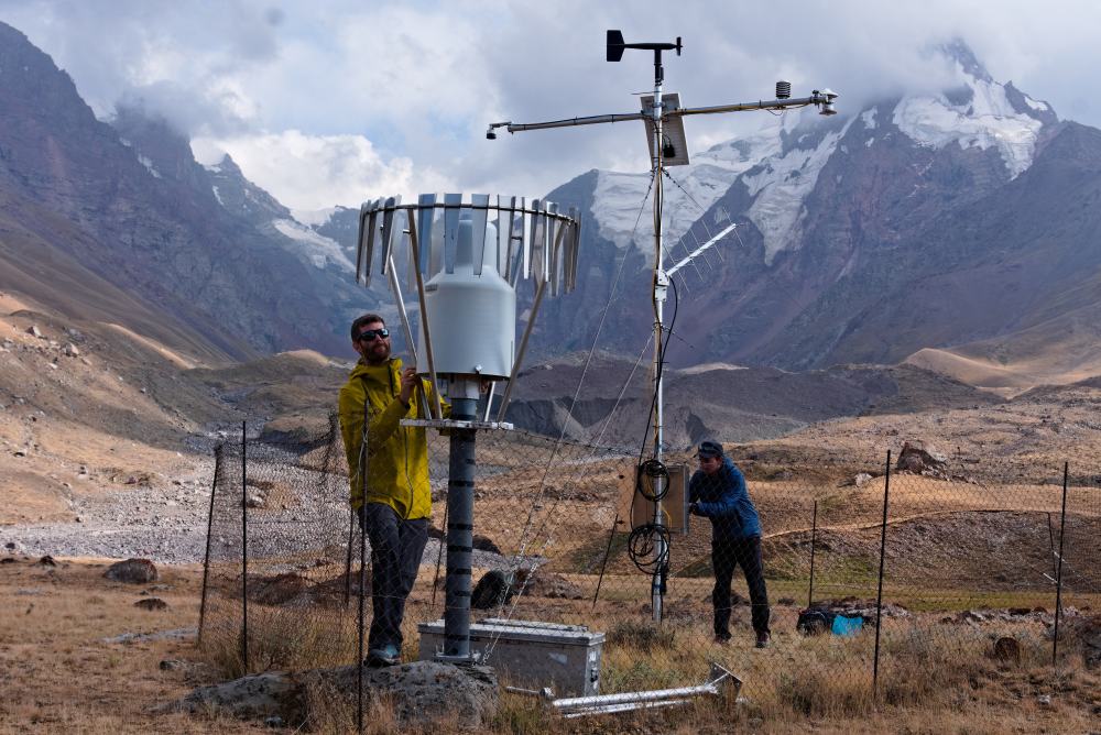 Members of the Pellicciotti Group of the Institute of Science and Technology Austria (ISTA) working on a precipitation monitoring station in the Kyzylsu Glacier’s catchment area. Northwestern Pamir Mountains, central Tajikistan.